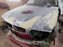 Фото процесса ремонта капота авто